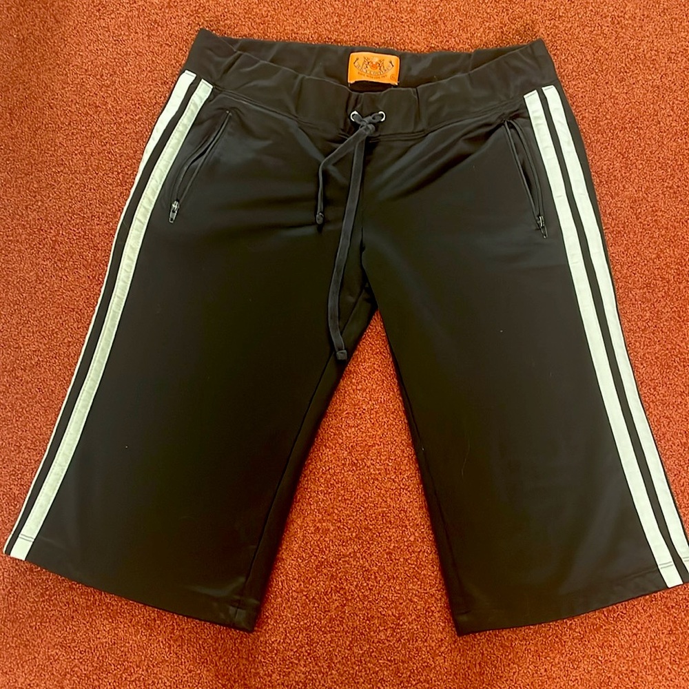 Juicy Couture early 2000s black long track shorts w/ white stripes down the side